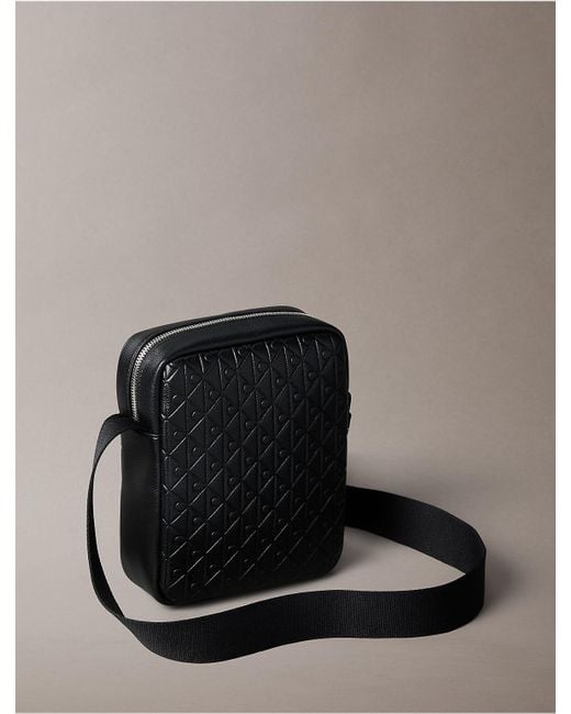 Calvin Klein Black Embossed Allover Monogram Reporter Bag for men