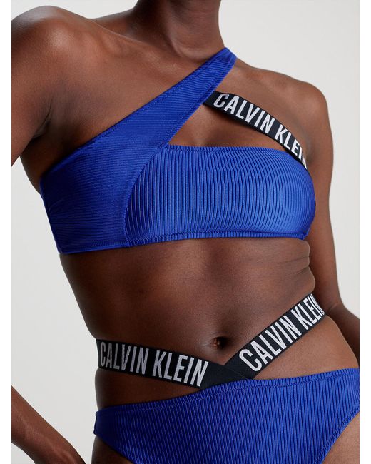 Bas de bikini échancré - Intense Power Calvin Klein en coloris Blue