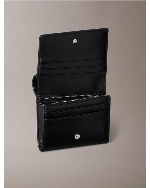Calvin Klein Multicolor Embossed Monogram Bifold Wallet