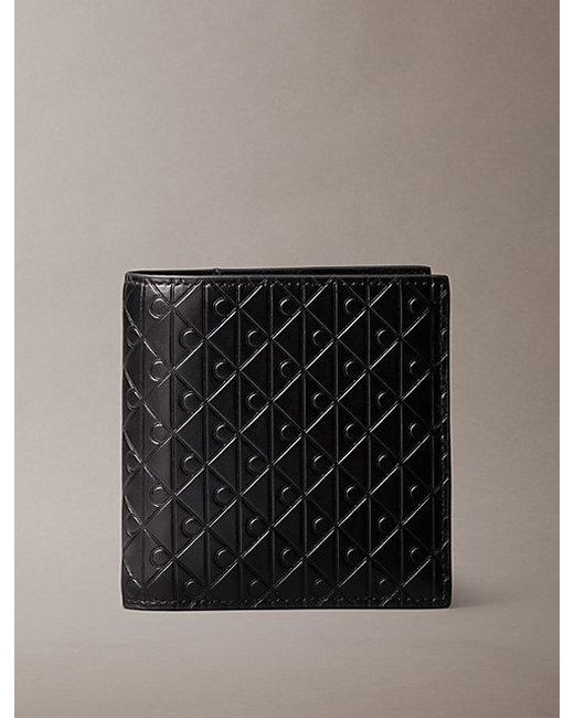 Calvin Klein Black Embossed Emblem Trifold Wallet for men