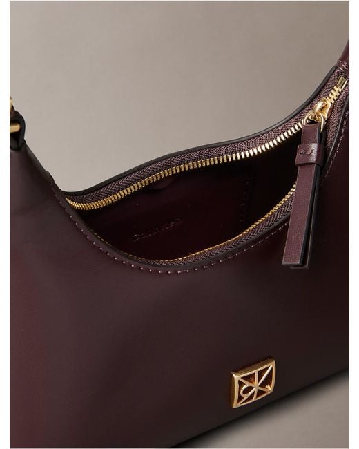 Calvin Klein Brown Monogram Logo Emblem Leather Small Shoulder Bag