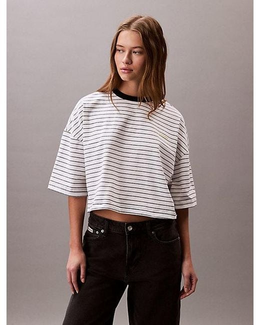 Camiseta boxy a rayas cropped Calvin Klein de color White