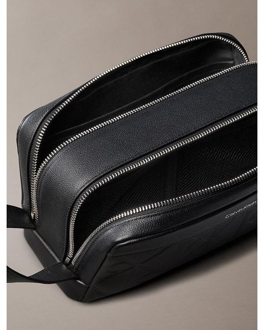Calvin Klein Gray Embossed Emblem Logo Dopp Kit for men