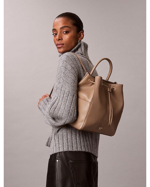 Calvin Klein Natural Monogram Drawstring Backpack
