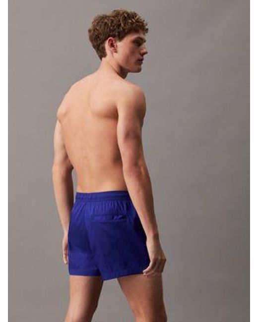Bañador corto con cordón antidesgarro Calvin Klein de hombre de color Blue
