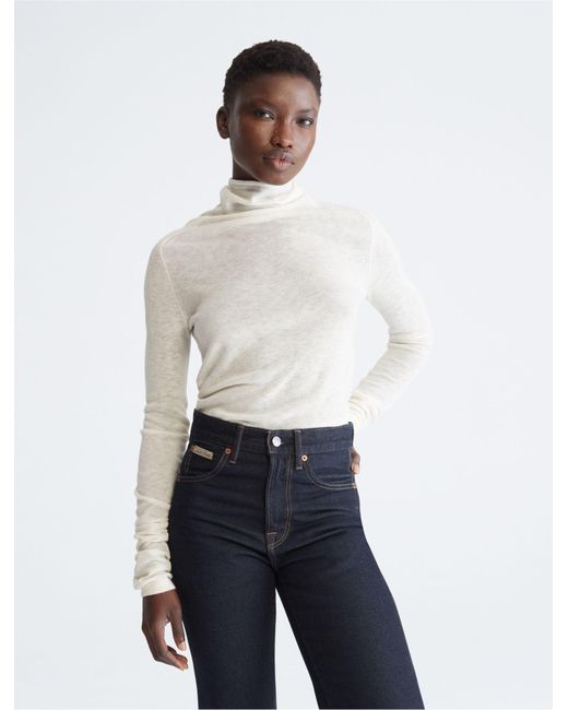 Calvin Klein Uplift Merino Wool Blend Turtleneck Sweater in White | Lyst