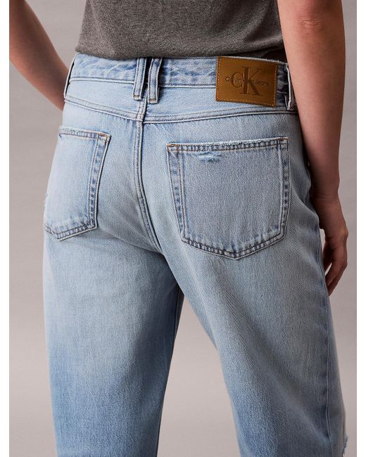 Jeans Distressed 90's Relaxed di Calvin Klein in Blue