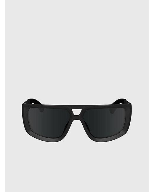 Gafas de sol rectangulares modificadas CKJ24605S Calvin Klein de color Black