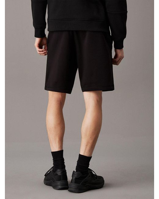 Calvin Klein Black Monogram Fleece Jogger Shorts for men