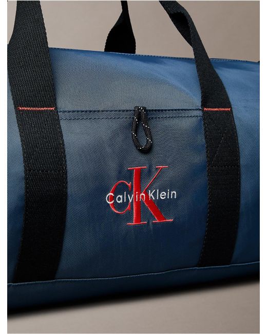 Calvin Klein Blue Monogram Logo Duffle Bag for men