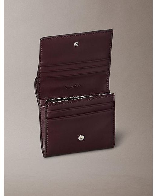 Calvin Klein Brown Embossed Monogram Bifold Wallet