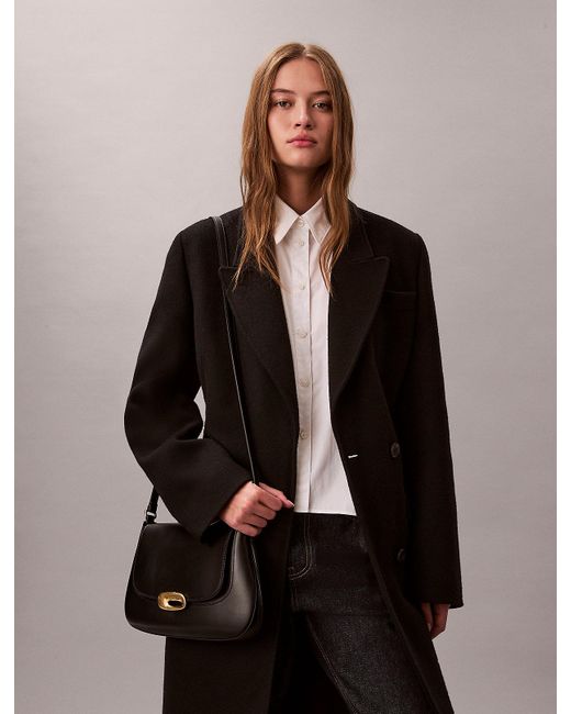 Calvin Klein Black Engraved Medium Flap Crossbody Bag