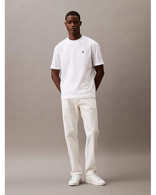 Calvin Klein T-Shirt mit Rundhalsausschnitt, relaxter Passform und Archive-Logo in White für Herren