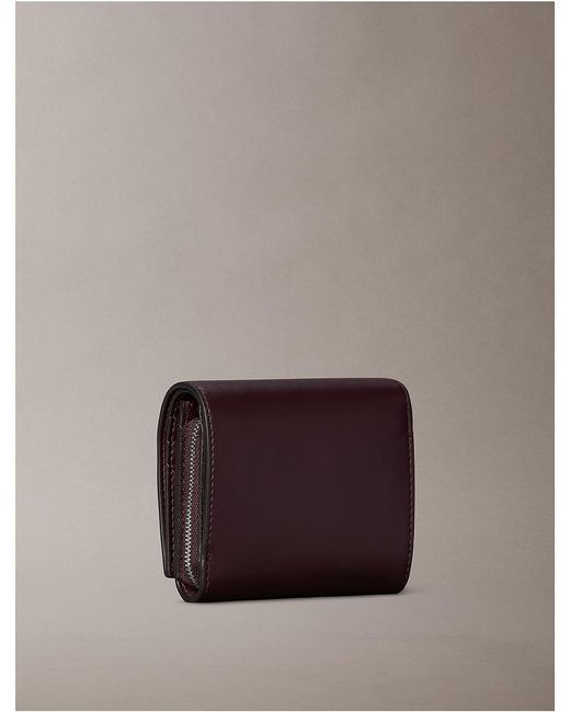 Calvin Klein Brown Embossed Monogram Bifold Wallet