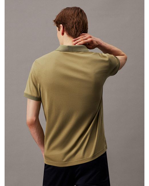 Polo à fermeture éclair passepoilée Calvin Klein pour homme en coloris Green