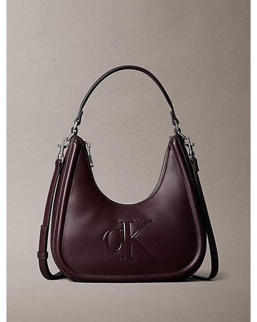 Calvin Klein Multicolor Embossed Monogram Crescent Bag