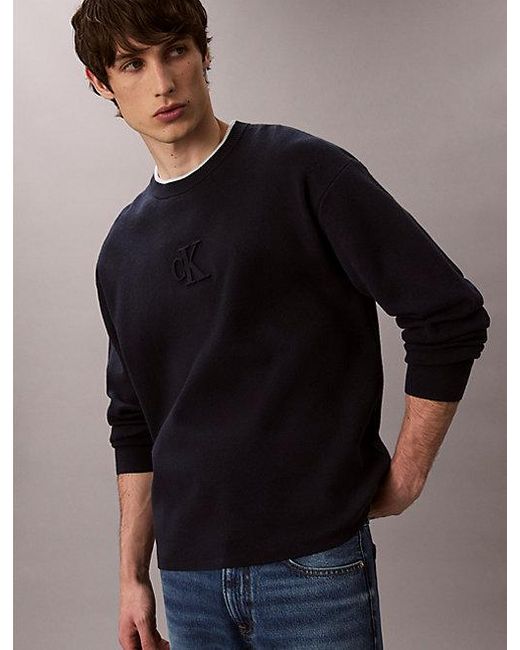 Calvin Klein Black Jeans Embossed Monogram Logo Relaxed Jumper for men