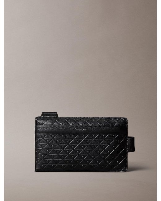 Calvin Klein Gray Embossed Emblem Logo Sling Bag for men