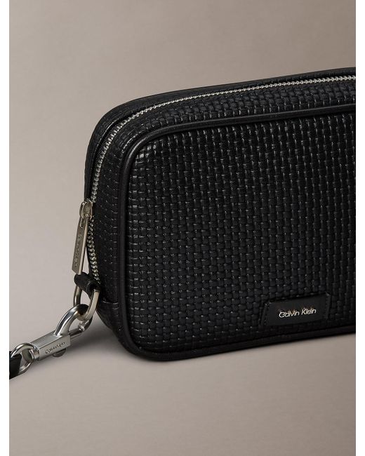 Calvin Klein Black Embossed Woven Zip Pouch for men