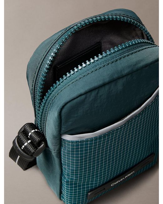 Calvin Klein Blue Striped Utility Zip Slim Reporter Bag for men