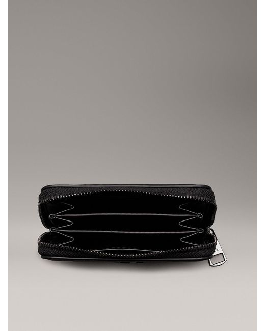 Portefeuille zippé anti-RFID Calvin Klein en coloris Black