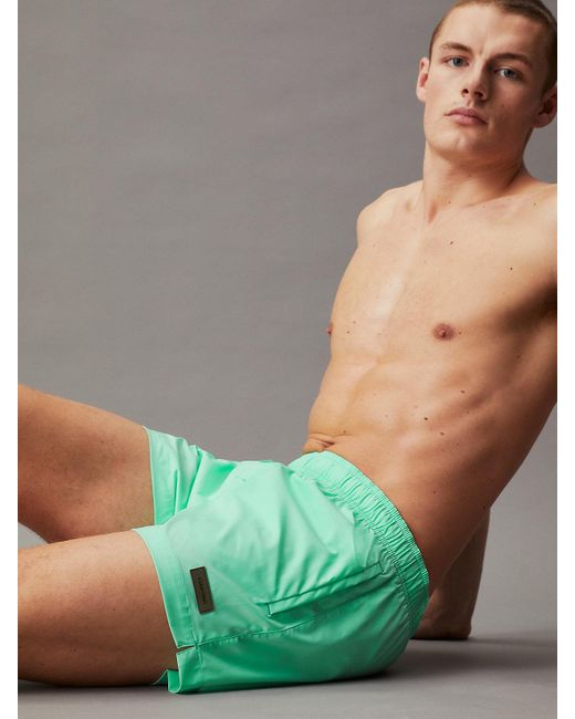 Short de bain court avec cordon de serrage Calvin Klein pour homme en coloris Green