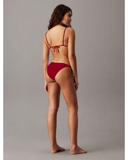 Parte de arriba de bikini de triángulo - CK Essentials Calvin Klein de color Red