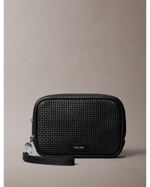 Calvin Klein Black Embossed Woven Zip Pouch for men