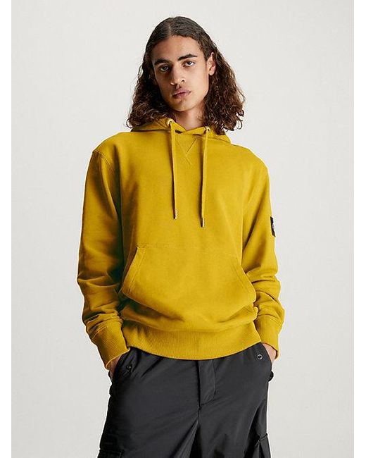 Sudadera con capucha de felpa de algodón con insignia Calvin Klein de hombre de color Yellow