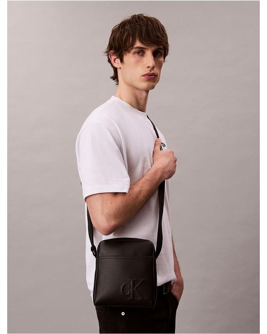 Calvin Klein Black Embossed Monogram Logo Reporter Bag for men