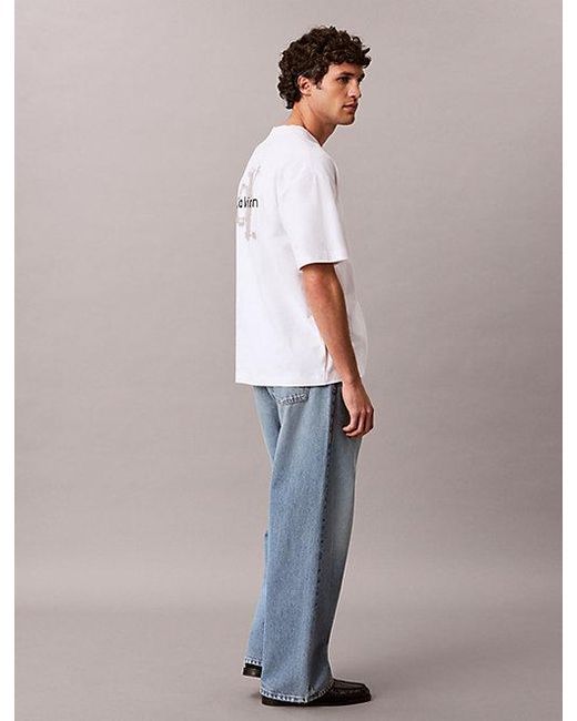 Calvin Klein Blue Jeans Oversized Embossed Logo T-Shirt for men