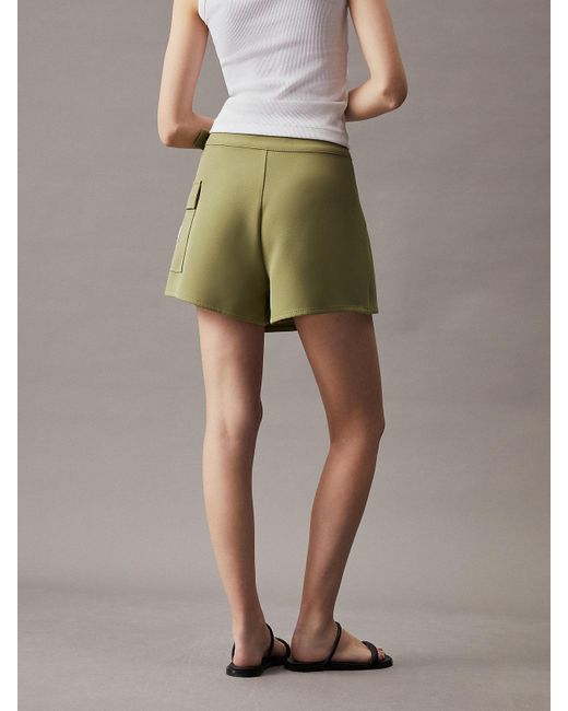 Jupe-short portefeuille utilitaire Calvin Klein en coloris Natural