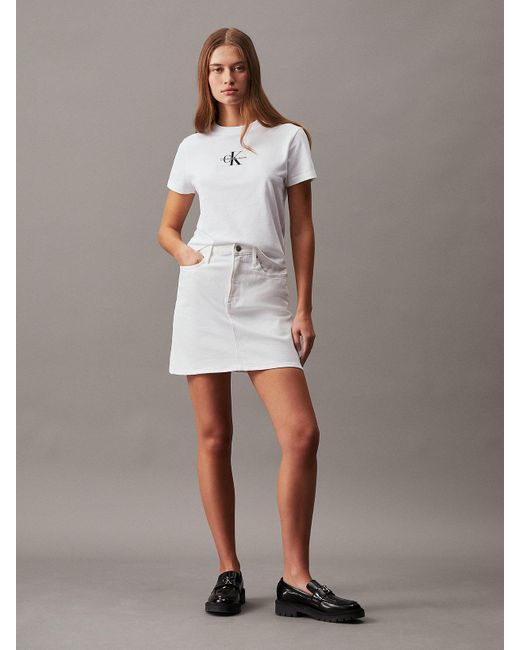 Mini-jupe en jean taille haute Calvin Klein en coloris White
