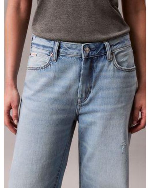 Relaxed 90's Distressed Jeans Calvin Klein de color Blue