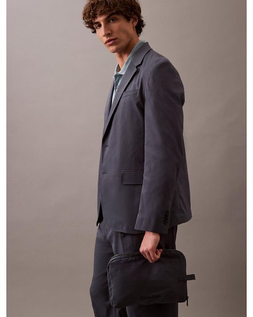 Calvin Klein Blue Slim Tech Travel Blazer for men