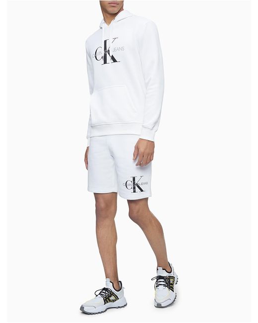 Calvin Klein White Monogram Logo Drawstring Fleece Shorts for men