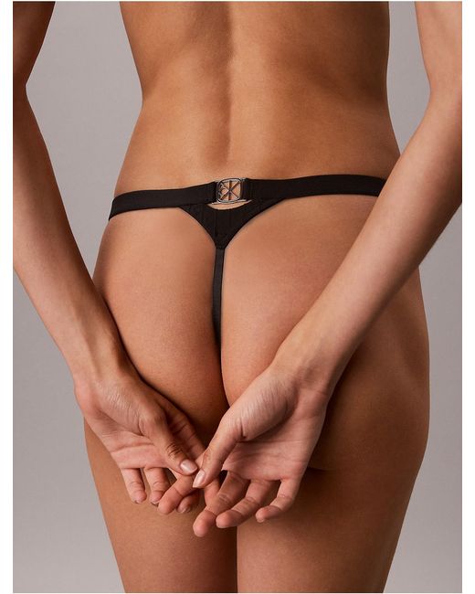 Calvin Klein Brown Embossed Emblem String Thong