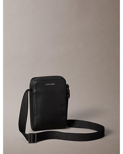 Calvin Klein Black Emblem Hardware Crossbody Phone Bag for men