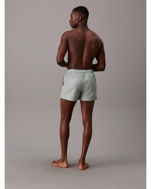 Short de bain court indéchirable avec cordon de serrage Calvin Klein pour homme en coloris Brown