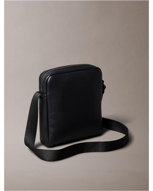 Calvin Klein Black Embossed Monogram Logo Reporter Bag for men