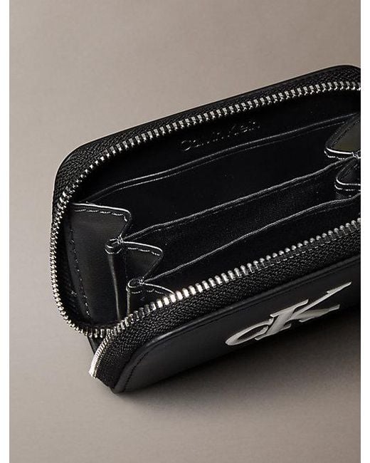 Calvin Klein Black Embossed Monogram Zip Wallet