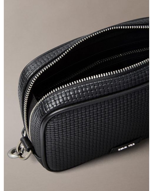 Calvin Klein Black Embossed Woven Zip Pouch for men