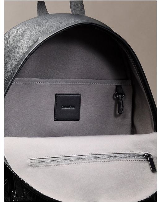 Calvin Klein Black Embossed Emblem Logo Trolley Backpack for men