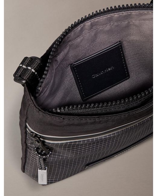 Calvin Klein Black Striped Utility Zip Flat Pack for men