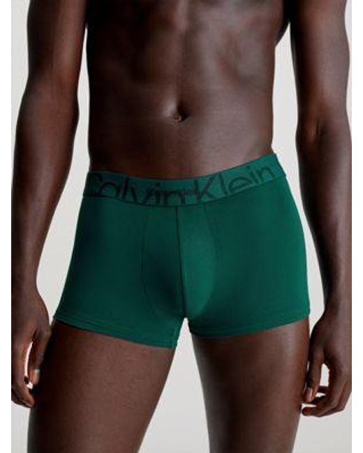 Bóxers de tiro bajo - Embossed Icon Calvin Klein de hombre de color Green