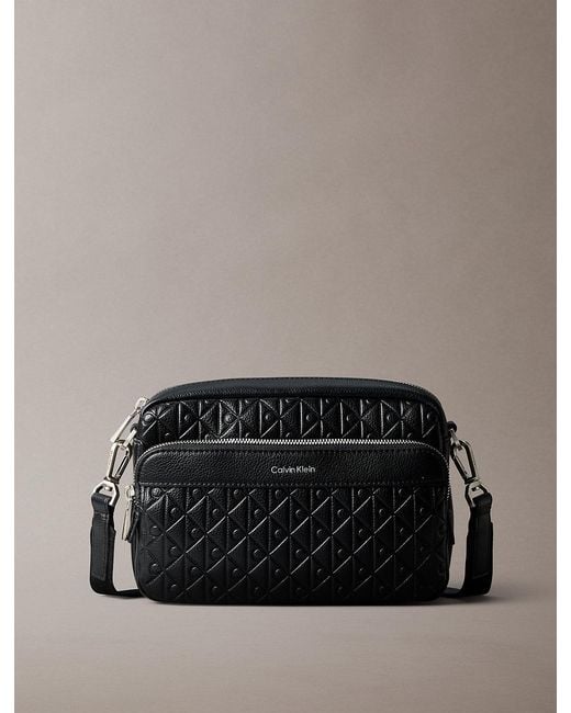 Calvin Klein Black Embossed Emblem Logo Camera Bag for men