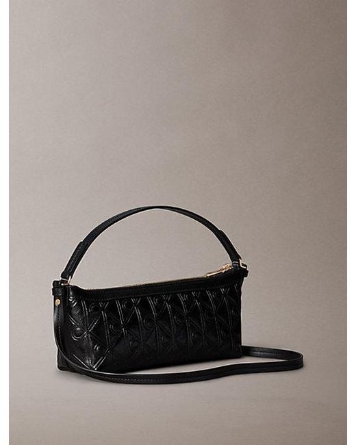 Calvin Klein Black Debossed Allover Emblem Logo Long Shoulder Bag
