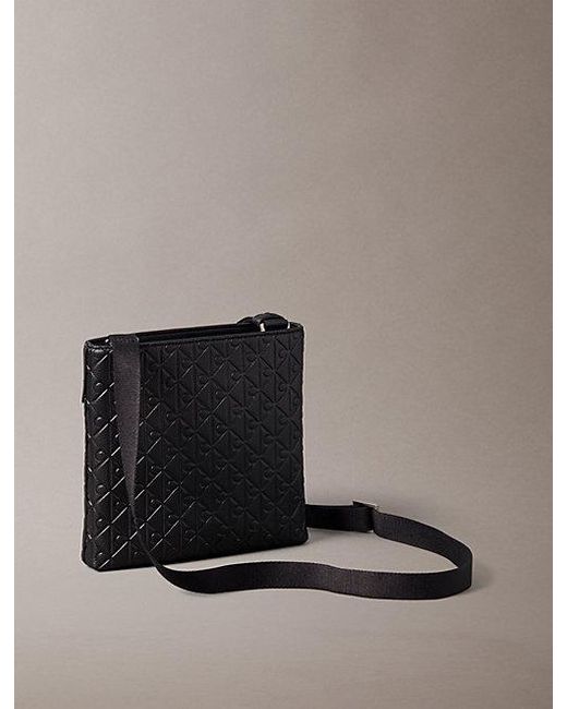 Calvin Klein Black Embossed Emblem Logo Flat Pack for men