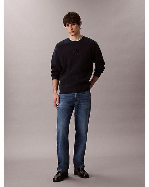 Calvin Klein Black Jeans Embossed Monogram Logo Relaxed Jumper for men