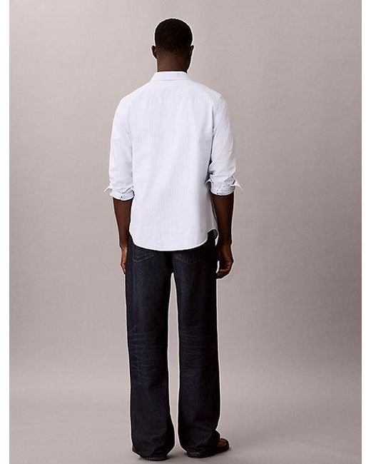 Calvin Klein White Jeans Baggy Jeans for men